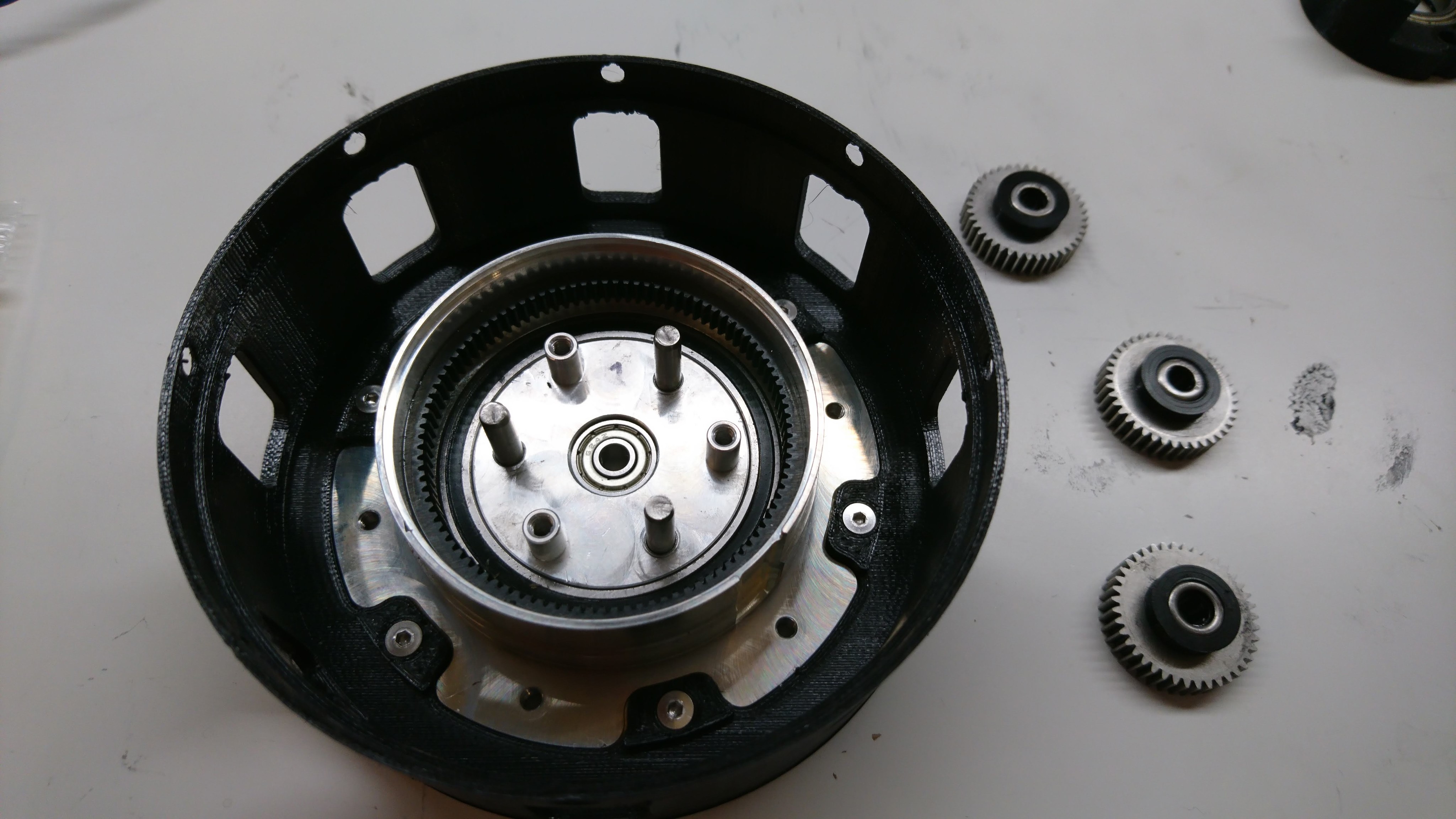 Planet output and planet gears partially assembled