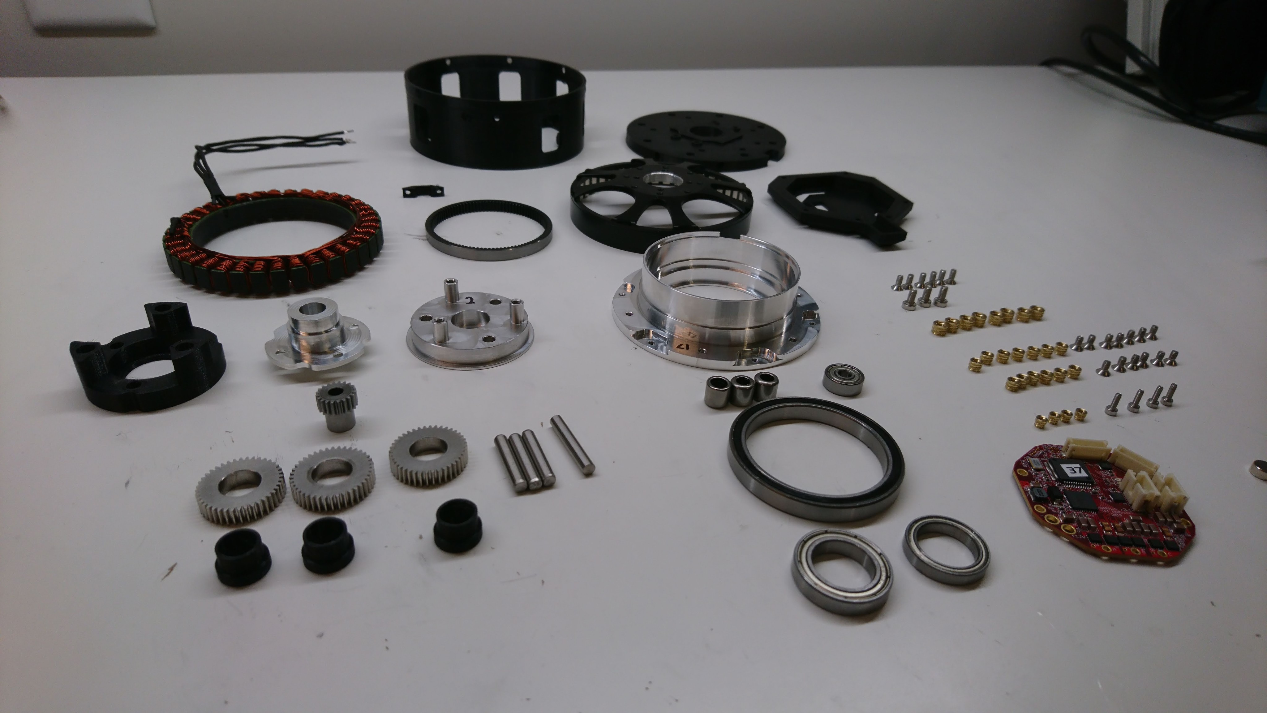 All the parts laid out for one servo