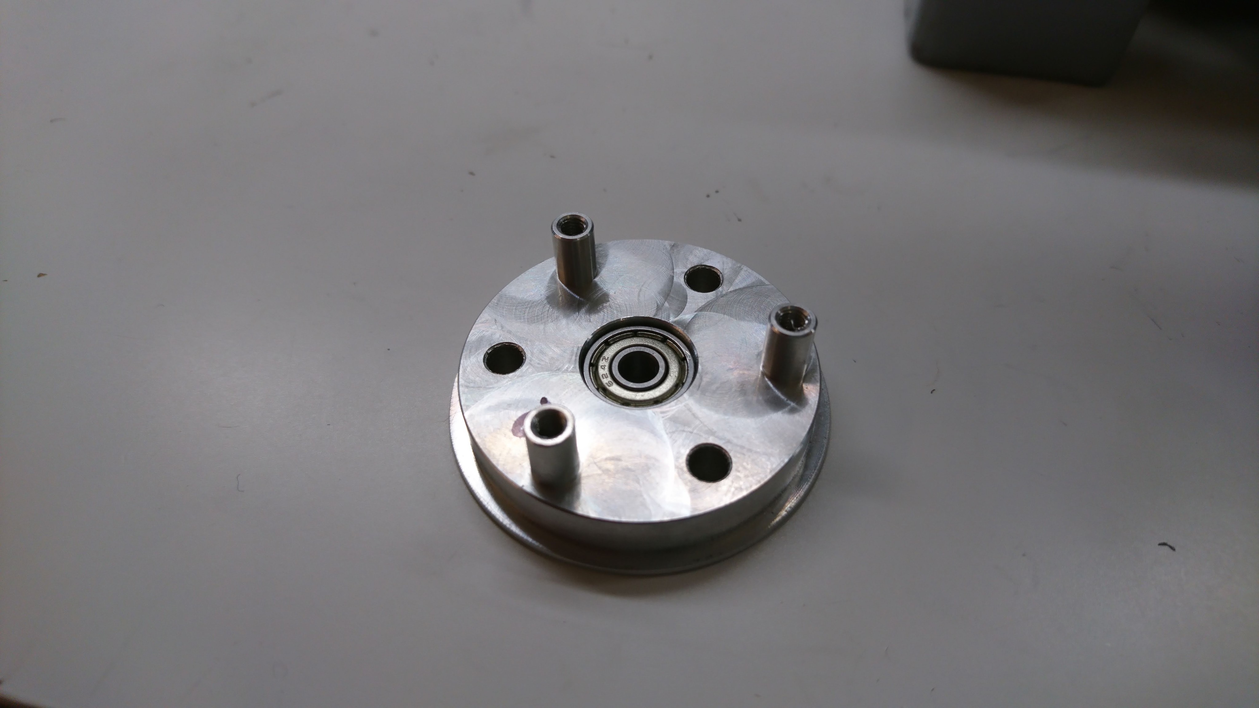 Output shaft bearing installed in planet output