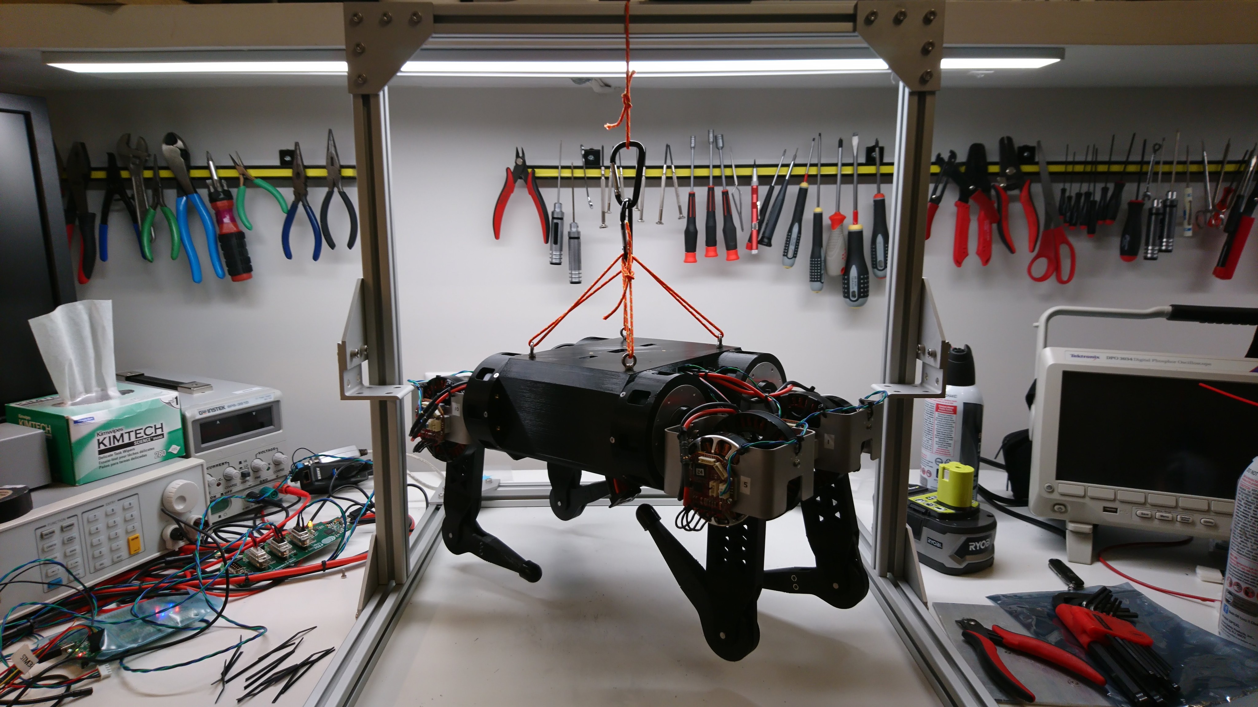 Suspended from the test fixture