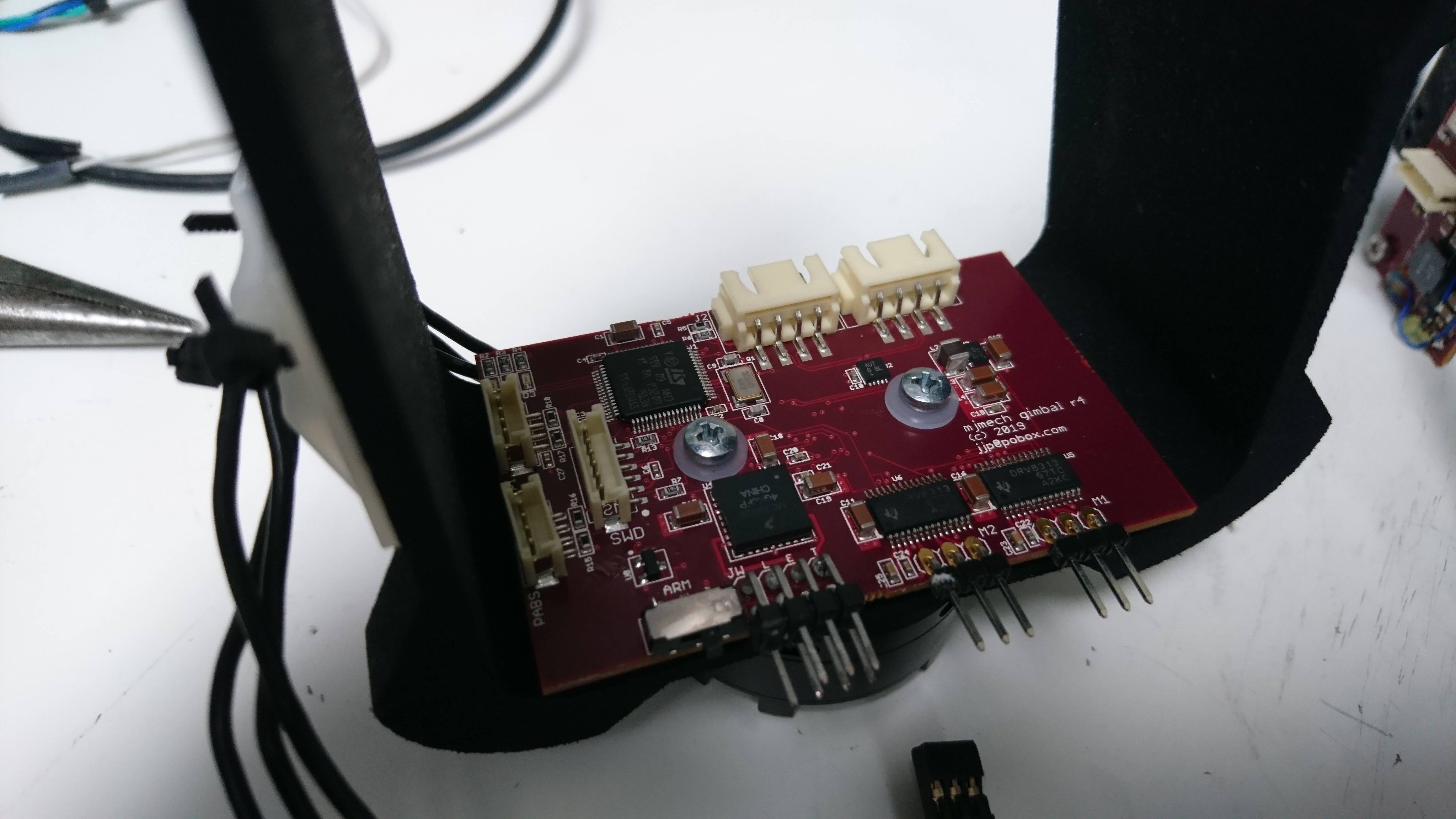 Mounted in bottom of turret