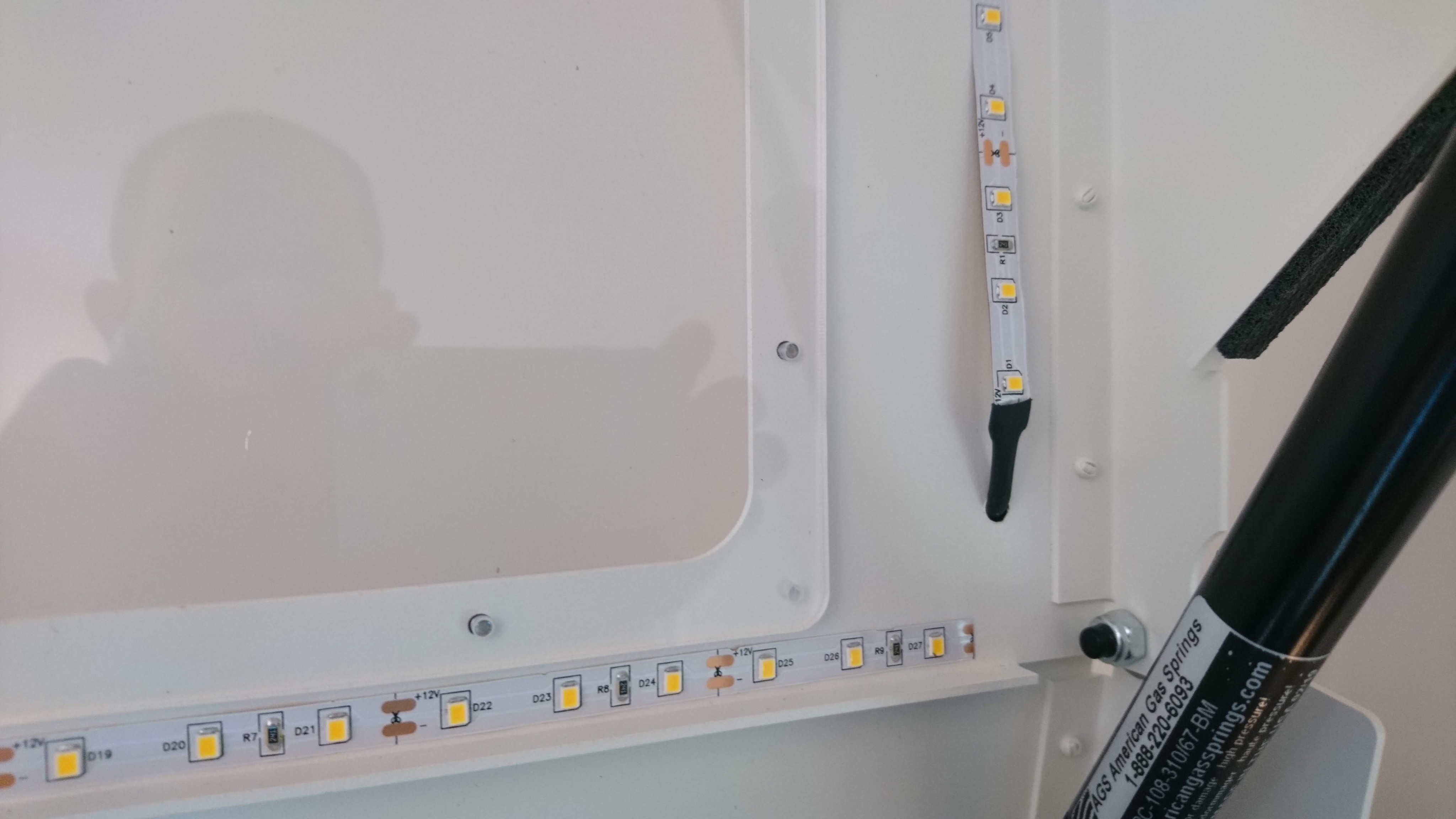 The strip enters through a small drilled hole