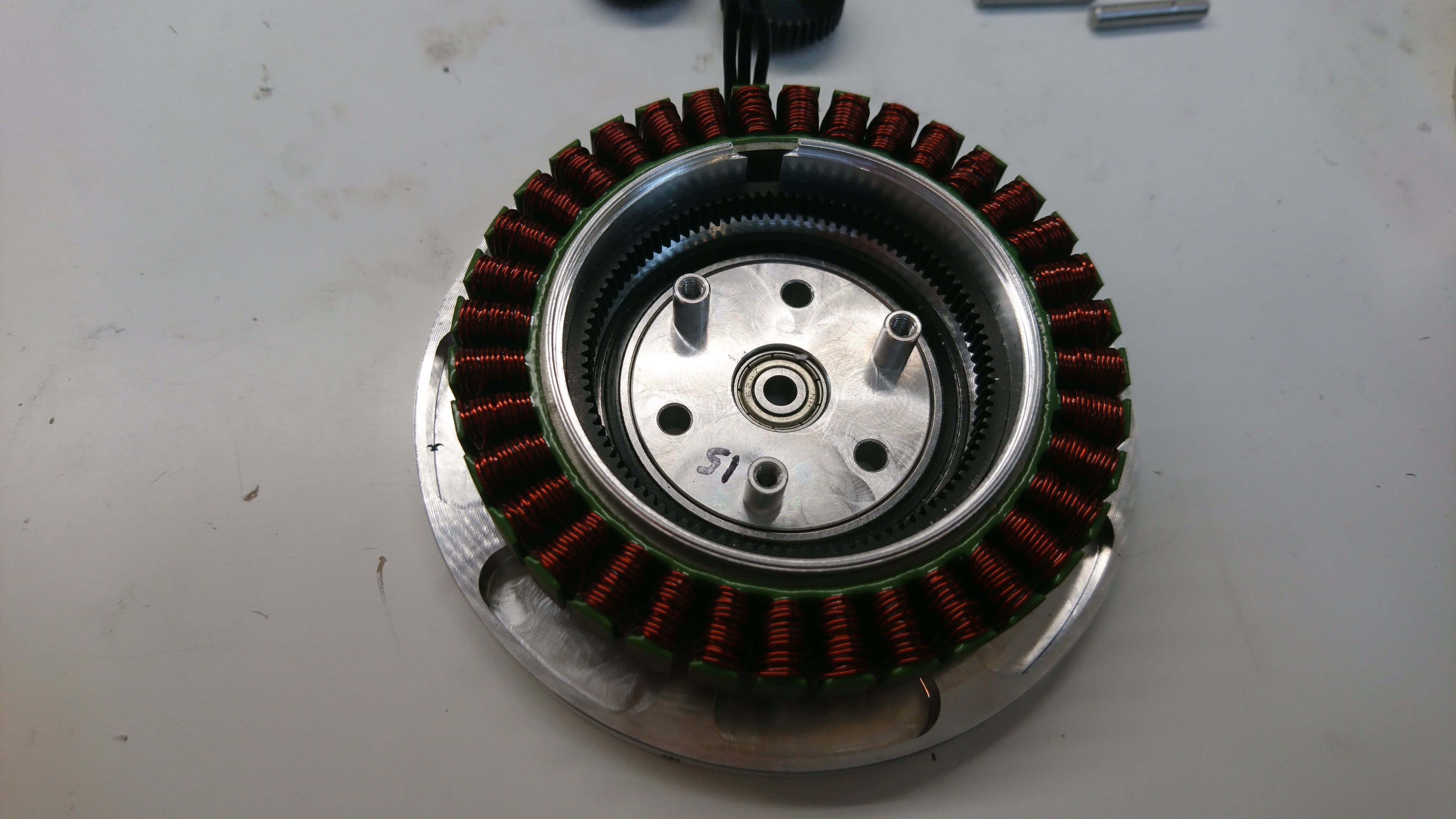 Front housing with stator, internal gear, and planet output installed